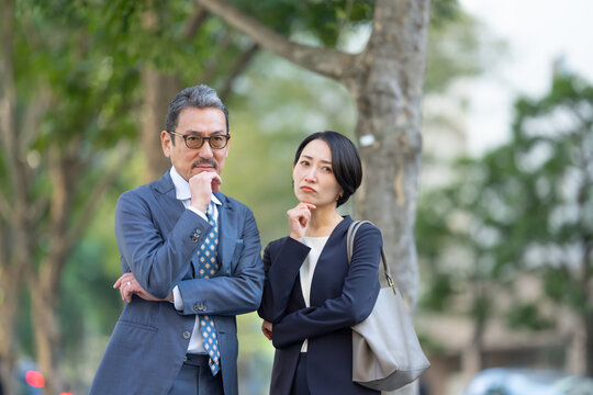 ビジネス　悩む　男性　女性