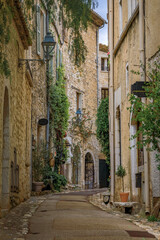 Old stone houses on a street in medieval Saint Paul de Vence, South of France © SvetlanaSF