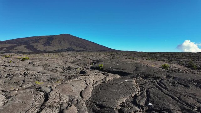 Scenic footage landscape of Piton de la Fournaise (Peak of the Furnace) 2632m, a volcano on the eastern side of Reunion island in the Indian Ocean and one of the most active volcanoes in the world.	