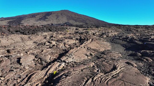 Scenic footage landscape of Piton de la Fournaise (Peak of the Furnace) 2632m, a volcano on the eastern side of Reunion island in the Indian Ocean and one of the most active volcanoes in the world.	