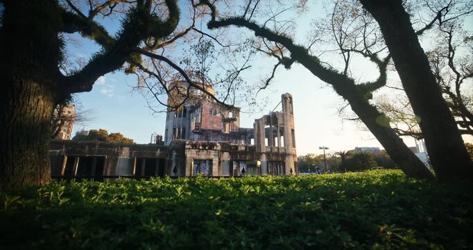 Hiroshima Peace Memorial Atomic Bomb Dome Framed by Trees - Slow, tracking shot