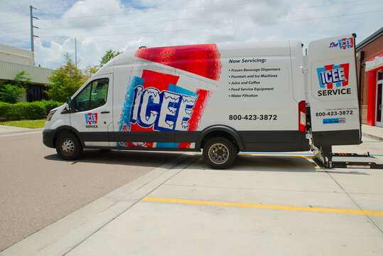 ICEE Service Van Parked With Open Rear Lift Delivering Frozen Beverage Machine Service Editorial Use Only St. Petersburg, FL USA  June 11, 2026 graphics advertising frozen beverage and fountain machin