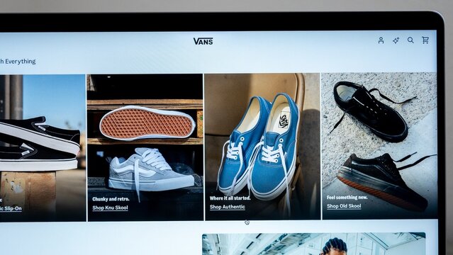 Mexico city, mexico, 05 28 2025: Laptop displaying vans website showing various shoes and a skater