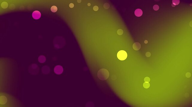 A collection of vibrant bokeh lights in green, yellow, and purple hues with soft focus and glowing effects, creating an abstract background suitable for various designs.
