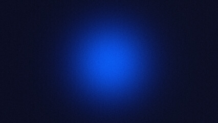 Abstract dark blue radial gradient background with center glow and grain texture © Arthapicture