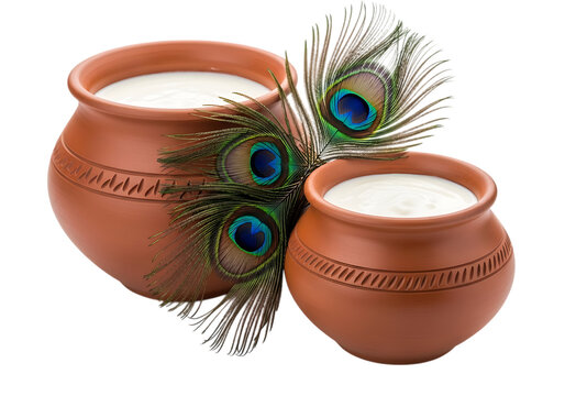 Two traditional clay pots filled with milk and peacock feathers isolated on transparent background