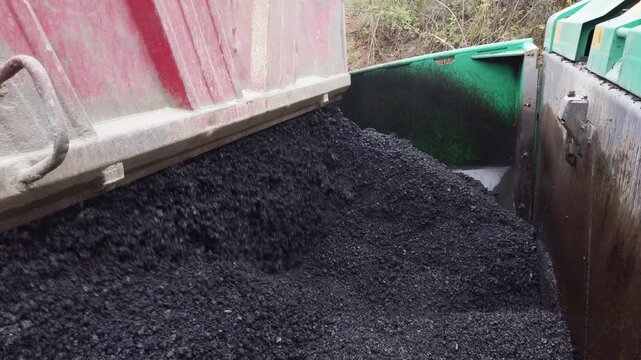 Road construction. Asphalt pavement machine making new layer of asphalt