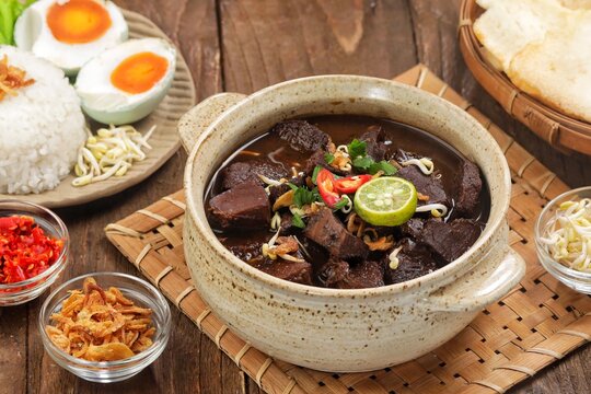Rawon is a typical Indonesian dish originating from Ponorogo, East Java, which is a black meat soup with a mixture of special spices using kluwek.
