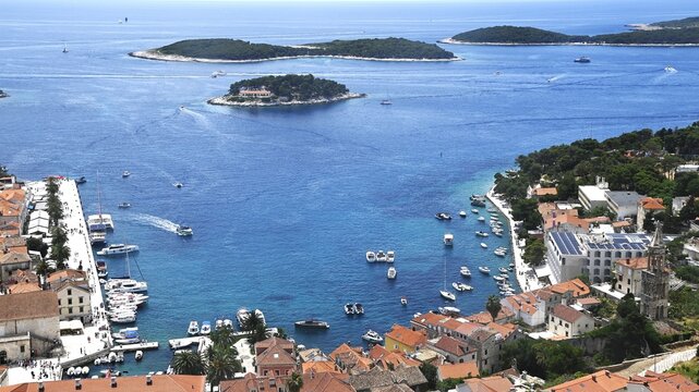 High angle panoramic view of Hvar town harbor and Pakleni Islands on a sunny summer day, Dalmatia, Croatia