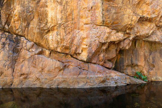 A detailed view of the layers and fault lines found in the sandstone walls of the Kimberley gorges.