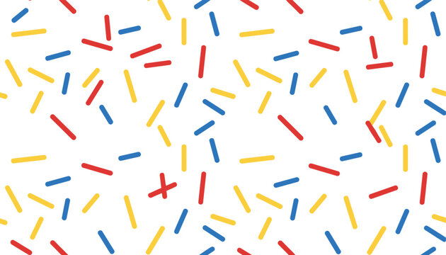 Seamless pattern of colorful red blue and yellow sprinkles or sticks scattered across a clean white background for celebration designs.