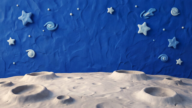 Whimsical handmade clay model of a moonscape with craters and a starry night sky.