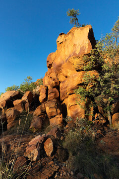 The deep orange and yellow colours of the sandstone formations found throughout the Kimberley region of Western Australia.