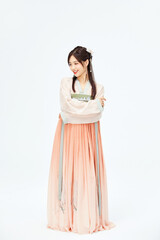 Fototapeta premium Smiling Woman in Traditional Chinese Hanfu Dress