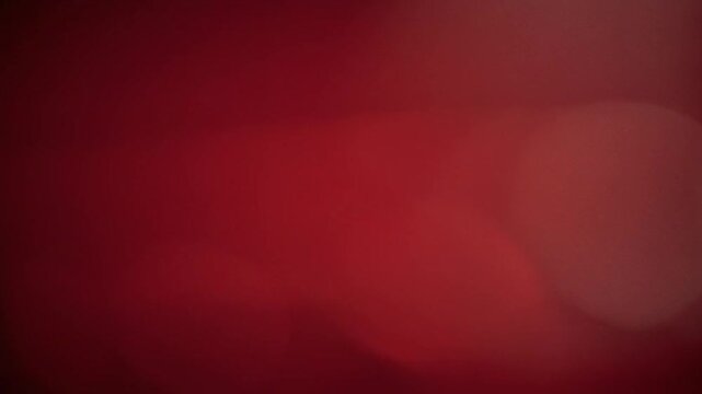 Abstract shimmering red bokeh lights background bokeh effect for festive celebrations and events