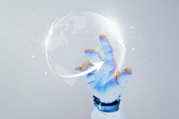 Futuristic hand touching a digital globe with glowing interface © Rawpixel.com
