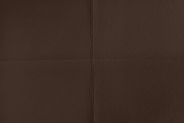 Fototapeta premium Dark brown textured paper background with subtle folds