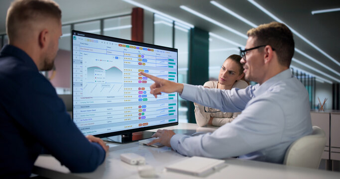 Medical Billing Analyst Reviews Coding Spreadsheets