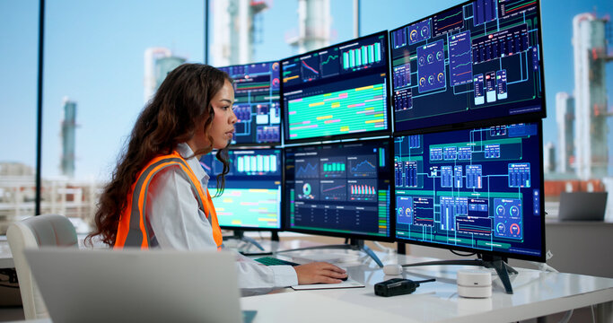 Engineer Using Computer Screens
