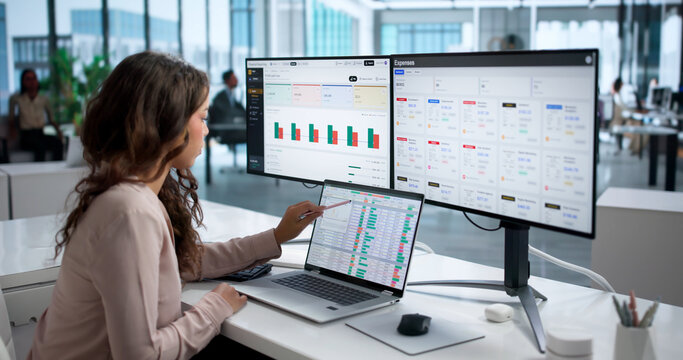 Financial Analyst Woman Using Laptop