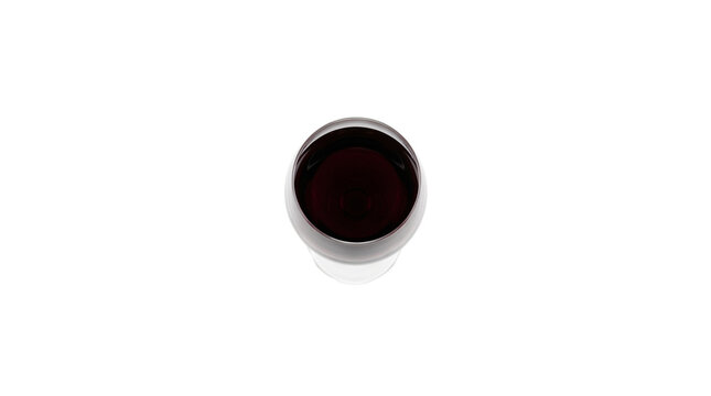 Glass of dark red wine isolated on white background top view.