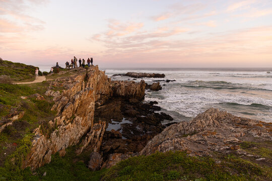 Sunset and dusk settling over beautiful Kammabaai Beach, Hermanus, South Africa