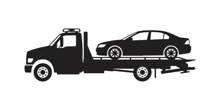 Tow truck carrying a car