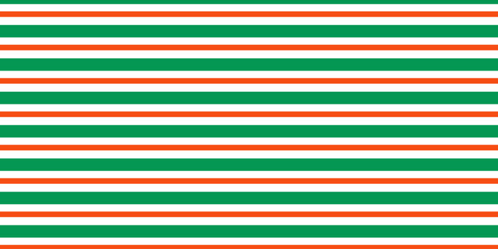 Christmas seamless pattern. Red and green diagonal stripes background. Candy cane repeating decoration wallpaper. Winter holiday lines backdrop. Xmas peppermint present wrapping print design. Vector