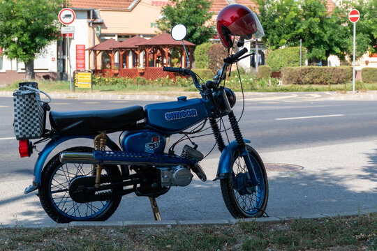 Blue Simson S51 Moped Parked on Urban Street