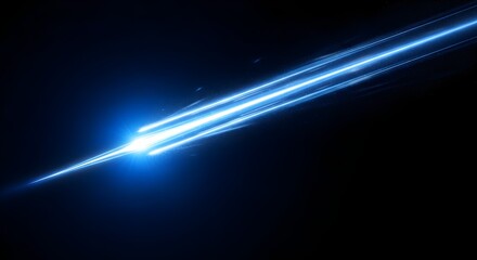 Fototapeta premium Bright blue streak of intense light moving rapidly across a deep black background creating a dynamic motion effect with glowing particles and smooth digital trails