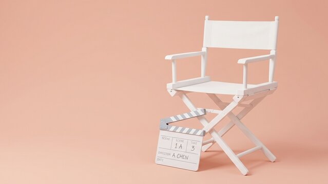 Minimalist white director chair and movie clapperboard on pink background representing creative film production and cinema industry concept
