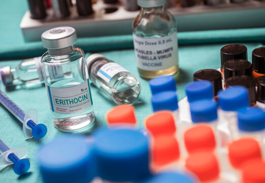 A vial of erythromycin for the treatment of diphtheria in a laboratory, a staged scene created in a photography studio, conceptual image