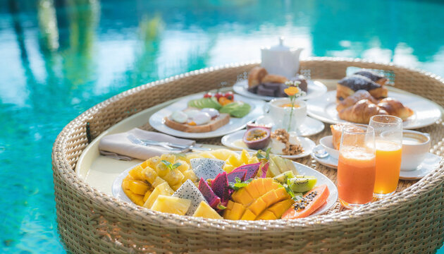 Close Up of Floating Breakfast in Tropical Resort Pool
