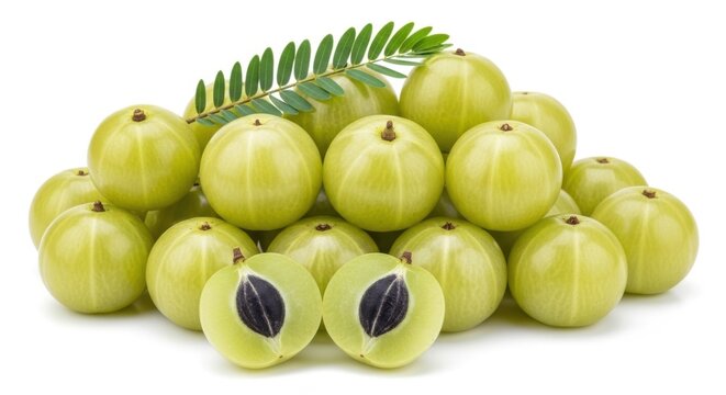 Fresh indian gooseberry or amla fruits with leaves isolated on white background