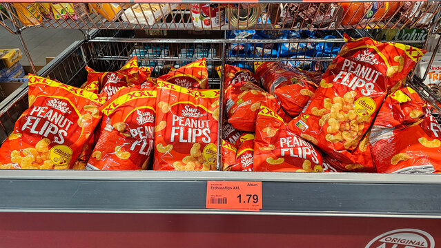 Sun snacks peanut flips xxl bags on supermarket shelf