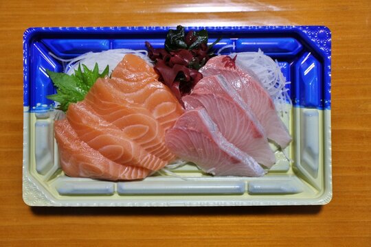 Salmon and buri (yellowtail) sashimi purchased at a supermarket in Tokyo, Japan