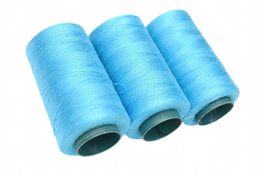 Three Spools of Light Blue Sewing Thread