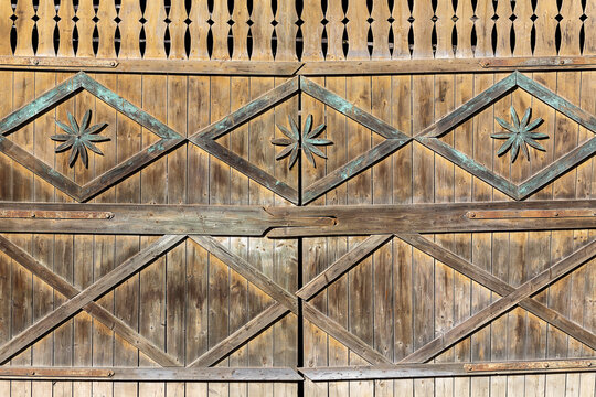 traditional romanian wooden gate with carved ornaments