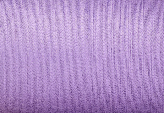 macro close up of thread texture fabric purple background handcraft theme wallpaper textile material design interior backdrop