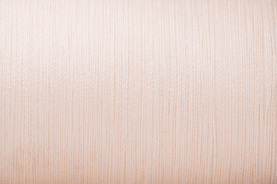 close up picture of beige thread texture fabric background handcraft theme wallpaper textile material design interior backdrop