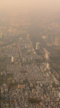 Dakc lake, Koperkhairne, Kopar Khairane, Navi Mumbai, Maharashtra, India. Mumbai Metropolitan Region. Aerial View From Airplane Window On View of the Mumbai suburb district. Evening morning sunset