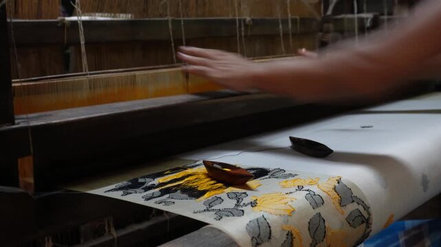 Artisan weaving premium saree on wooden handloom