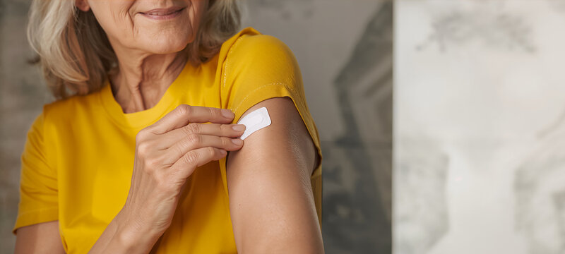 an elderly woman with a hormonal transdermal patch