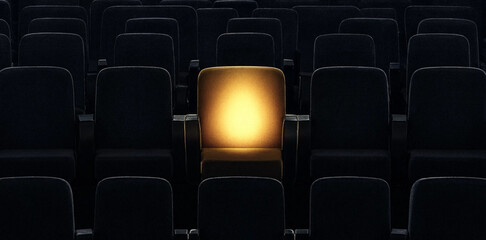 Fototapeta premium A single illuminated cinema chair glowing in a dark empty theater auditorium entertainment spotlight solitude performance interior abstract atmosphere presentation