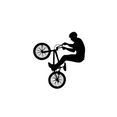 Naklejka premium Bmx rider performing a wheelie stunt silhouette