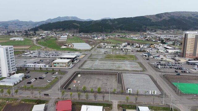 HOKKAIDO.  JAPAN .Modern town area with transport lines April 27 2026
