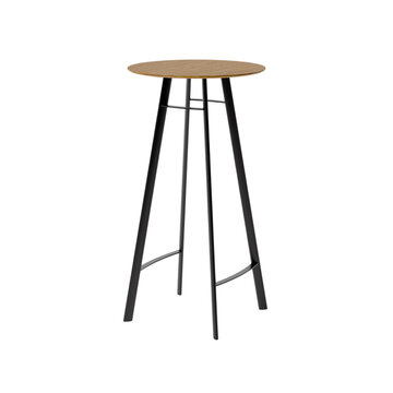 Round wooden tabletop bar stool with slender metal legs during studio lighting for commercial interiors