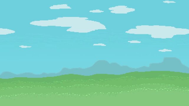  A sunny day in the background; mountains visible in the distance the grass glistens