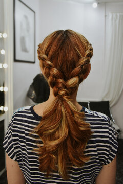 Double Dutch braid crown hairstyle with curly ponytail, hazelnut hair color with highlights