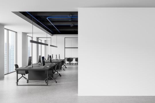 Modern office interior featuring empty wall mockup for clean creative design presentation within bright open workspace environment. 3D Rendering